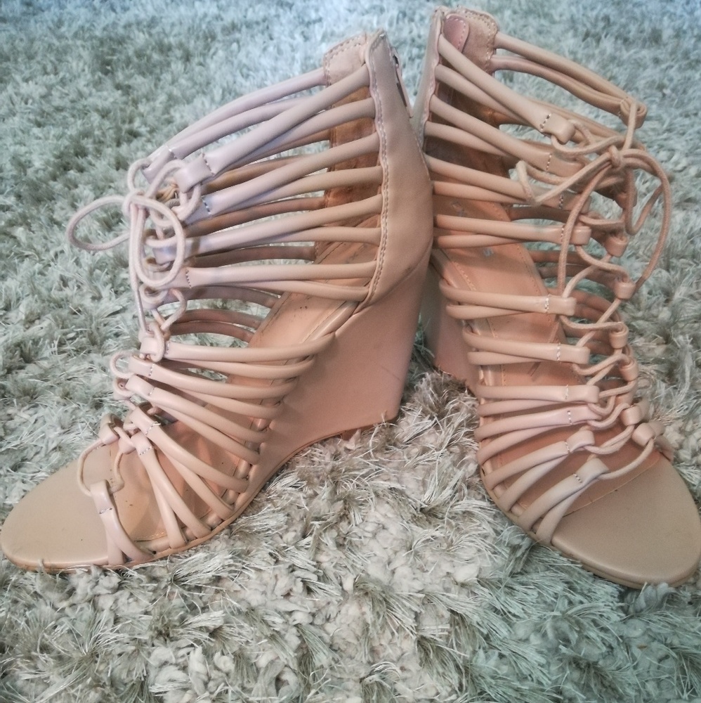 Express nude "tubular" tie-up wedges